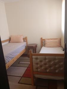 Voodi või voodid majutusasutuse Glamour Appartement toas