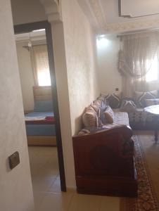 Voodi või voodid majutusasutuse Glamour Appartement toas