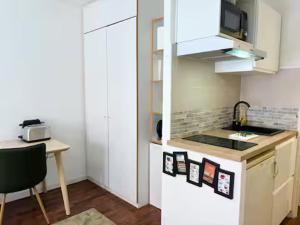Kuchyň nebo kuchyňský kout v ubytování Appartement en hyper-centre de Lille