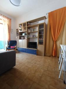 a living room with a couch and a table at AL40 - Turin Holiday Apartment in Turin