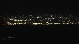 a view of a city at night with lights at Bayview Luxury Retreats 