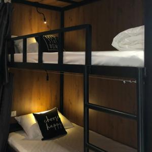 a couple of bunk beds in a room at Hanoi Dormiam - Wonderful Sightseeing of West Lake in Hanoi +38 photos