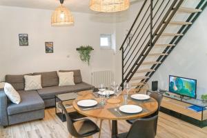 TV a/nebo společenská místnost v ubytování Maison de Charme