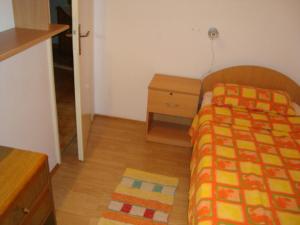 Postel nebo postele na pokoji v ubytování Blue Holidays Apartment