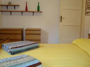 Postel nebo postele na pokoji v ubytování Blue Holidays Apartment