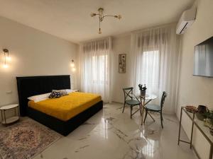 Katil atau katil-katil dalam bilik di Central home Cagliari