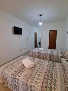 Postel nebo postele na pokoji v ubytování Belgrano 363