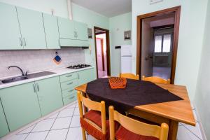 Køkken eller tekøkken på 17 Primo Piano + 15 billeder