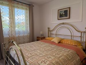 Postel nebo postele na pokoji v ubytování Dai Nonni