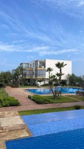Πισίνα στο ή κοντά στο Sidi Rahal Blue Beach