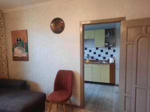 Kuchyň nebo kuchyňský kout v ubytování Apartment Shevchenko Panfilova