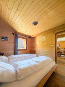 Vuode tai vuoteita majoituspaikassa Luxueux Chalet au centre de Champéry vue panoramique