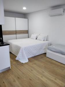 Ένα ή περισσότερα κρεβάτια σε δωμάτιο στο Green House