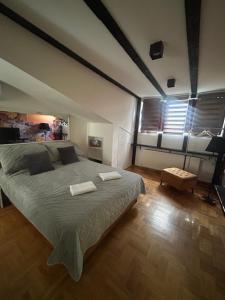 Postel nebo postele na pokoji v ubytování MM Apartman