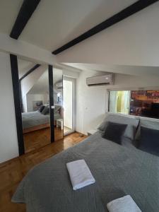 Postel nebo postele na pokoji v ubytování MM Apartman