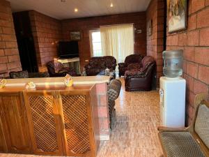 a living room with a fireplace and a room with a living room at Lavanda CITY in Sevan