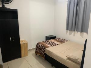 Katil atau katil-katil dalam bilik di Espaco Studio SM Araguaia