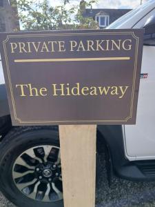 a sign for private parking in front of a car at The Hideaway Inverurie in Inverurie