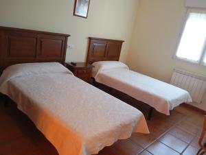Katil atau katil-katil dalam bilik di Hostal Buenavista +6 gambar