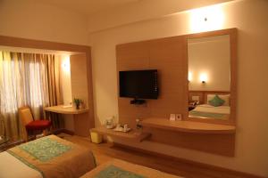 Letto o letti in una camera di IRA By Orchid Bhubaneswar
