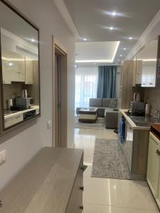 Kuchyň nebo kuchyňský kout v ubytování Fishta Apartment Q6 47 + 4 fotografie