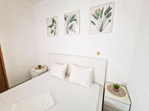 Ein Bett oder Betten in einem Zimmer der Unterkunft Villa Dusper