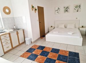 Ein Bett oder Betten in einem Zimmer der Unterkunft Villa Dusper