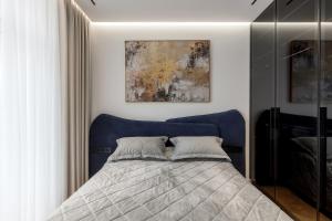 Ένα ή περισσότερα κρεβάτια σε δωμάτιο στο Renest Milano Elegance Stay