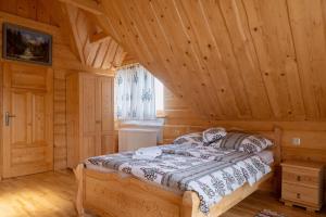 Ένα ή περισσότερα κρεβάτια σε δωμάτιο στο Tatra Break