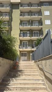 a set of stairs leading to a building at Marconi House - Appartamento in zona centrale 2-Bedr a Termini Imerese in Termini Imerese