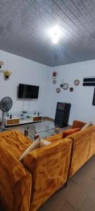 TV/trung tâm giải trí tại Dguizo résidence +2 ảnh