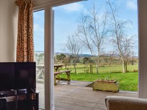 TV a/nebo společenská místnost v ubytování Exmoor View