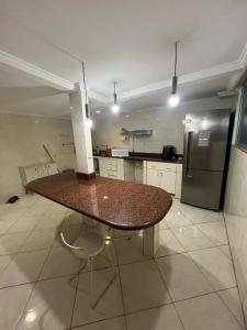 Η κουζίνα ή μικρή κουζίνα στο Casa camburi +7 φωτογραφίες