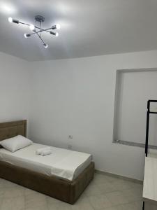 Ένα ή περισσότερα κρεβάτια σε δωμάτιο στο Gold Rooms I +1 φωτογραφίες