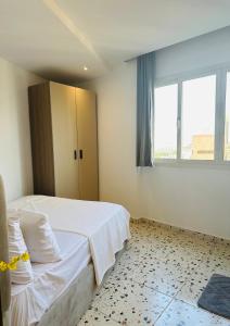 Postel nebo postele na pokoji v ubytování Casablanca stylish studio i904 TenTon Zamalek