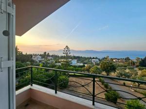 a view from the balcony of a house at Loukissia Villa Mare in Loukísia