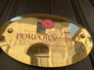 a sign for a popcorn house with a picture of a building at Porpora House in Novi Ligure