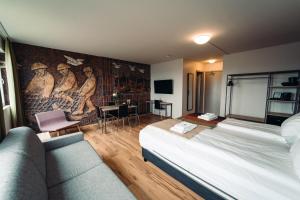 Postel nebo postele na pokoji v ubytování Geo Hotel