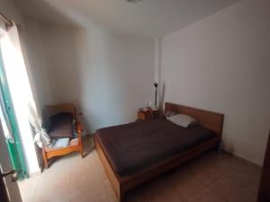 Una cama o camas en una habitación de Apartaestudio