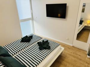 TV a/nebo společenská místnost v ubytování Holiday home with 4 bedrooms