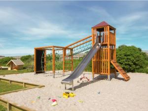 Thyborønにある4 star holiday home in Thyborønの砂滑り台付き遊び場