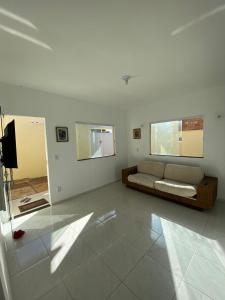 TV a/nebo společenská místnost v ubytování BIA BELA Aluguéis por Temporada em BHS