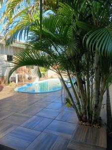 Piscina en o cerca de Edicula com um quarto banheiro e piscina e lazer