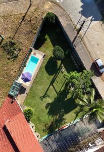 Un jardín fuera de Rm Hospedagem Ubatuba