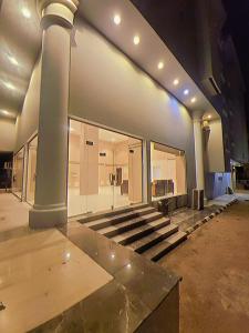 a building with a bunch of columns and stairs at دار الزائر1 in Al Madinah +22 photos