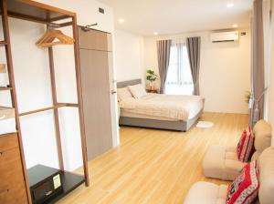 Katil atau katil-katil dalam bilik di Creamhouse Chiang Mai