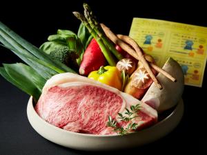 a bowl of food with meat and vegetables at APA Hotel & Resort Osaka Namba Ekimae Tower in Osaka +37 photos