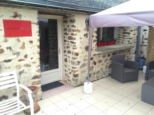 
A porch or other outdoor area at Domaine Des Mille Oiseaux
