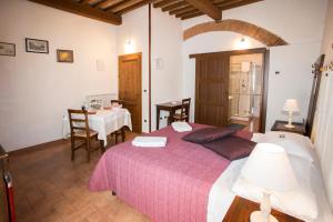 Posteľ alebo postele v izbe v ubytovaní Garden Relais Le Fontanelle