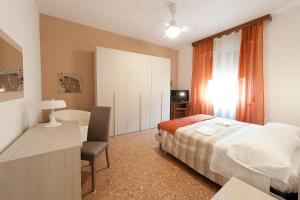Postel nebo postele na pokoji v ubytování Gardenia Guest House